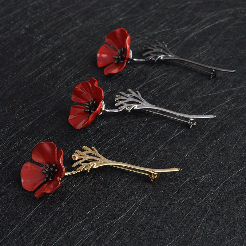 Red flower brooch