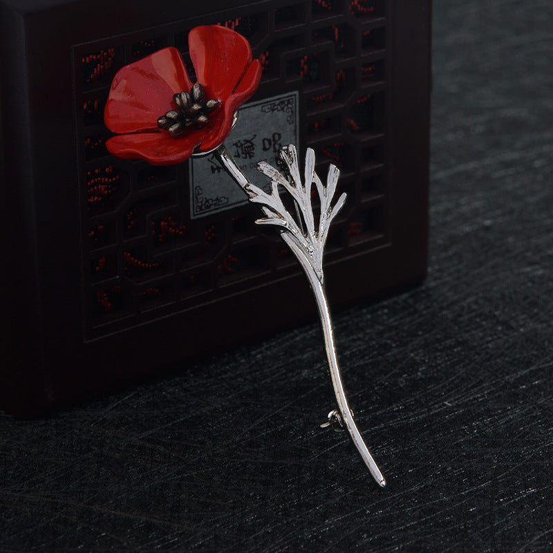 Red flower brooch